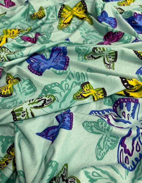 REF-201 BUTTERFLY PRINT VISCOSE KNIT. ITALY. A CUT OF 1-5/8 YARDS