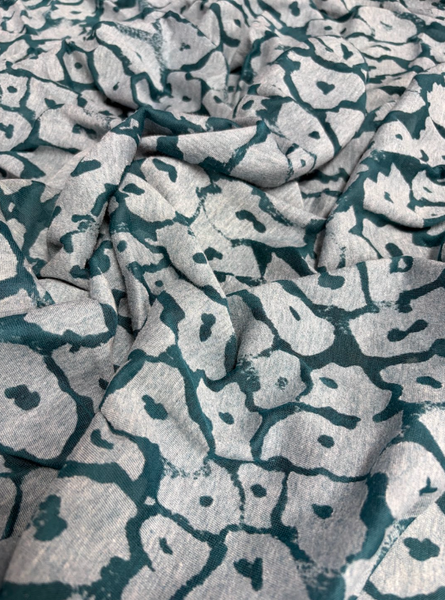 REF-217 LEOPARD BURNOUT DESIGN POLY KNIT. FRANCE. A CUT OF 2-1/2 YARDS.
